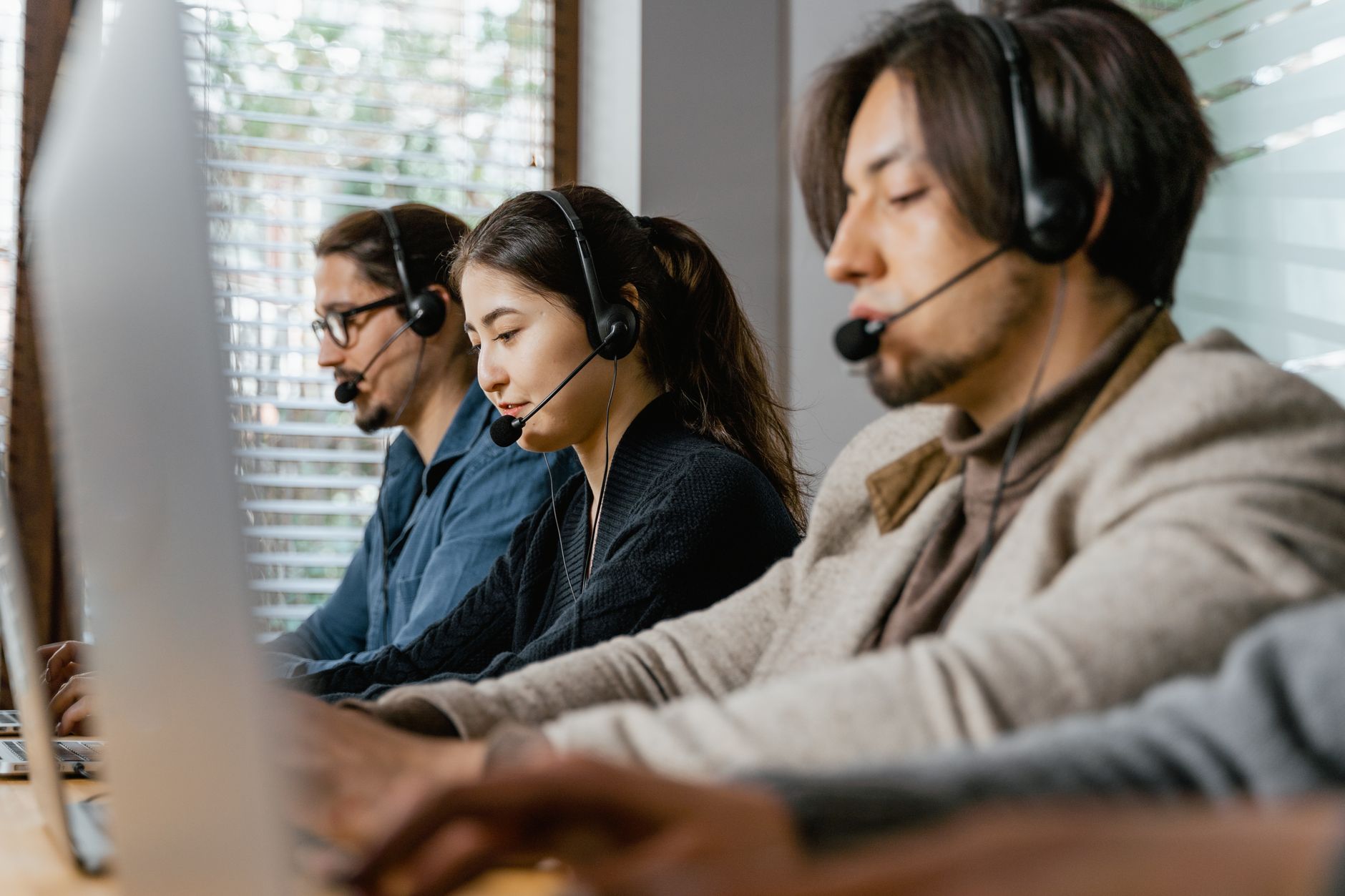 Call center agents wearing headsets