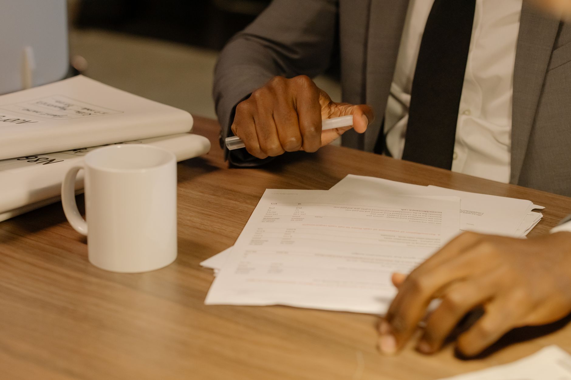 Business documents under review on a desk