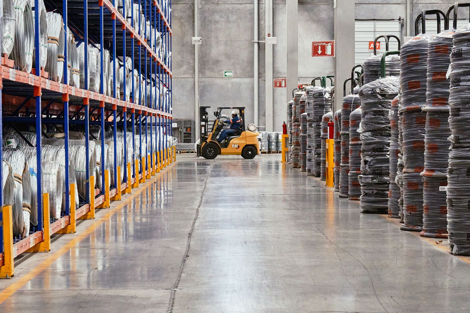 Warehouse aisle with stocked shelves